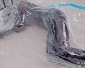 DOVE Latex bodysuit on vacuum bag breathplay