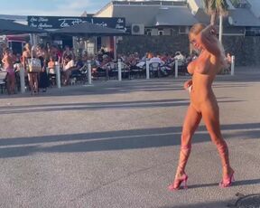 Monika Fox Walks The Streets Of Cap d'Agde Naked