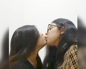 Real lesbian couple kissing