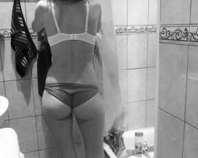 Slim MILF small tits and big booty washes and pees in the shower.