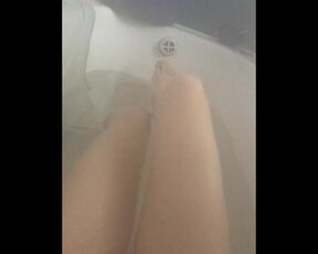 Hot babe taking bath