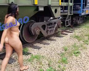 Girl strips naked in public train station